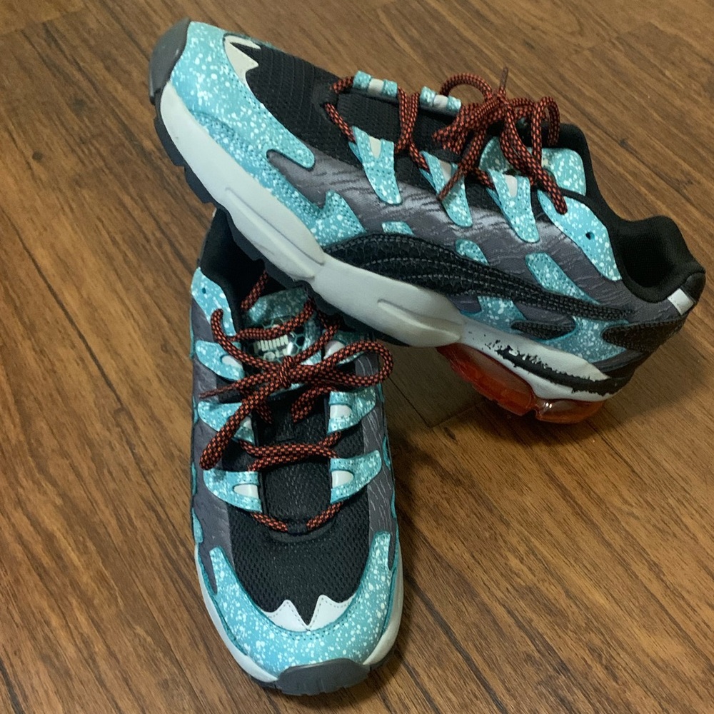 Puma size 12  teal, black, dark grey and dark orange